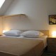 s�sz�ll�s: Rombon apartmanh�z